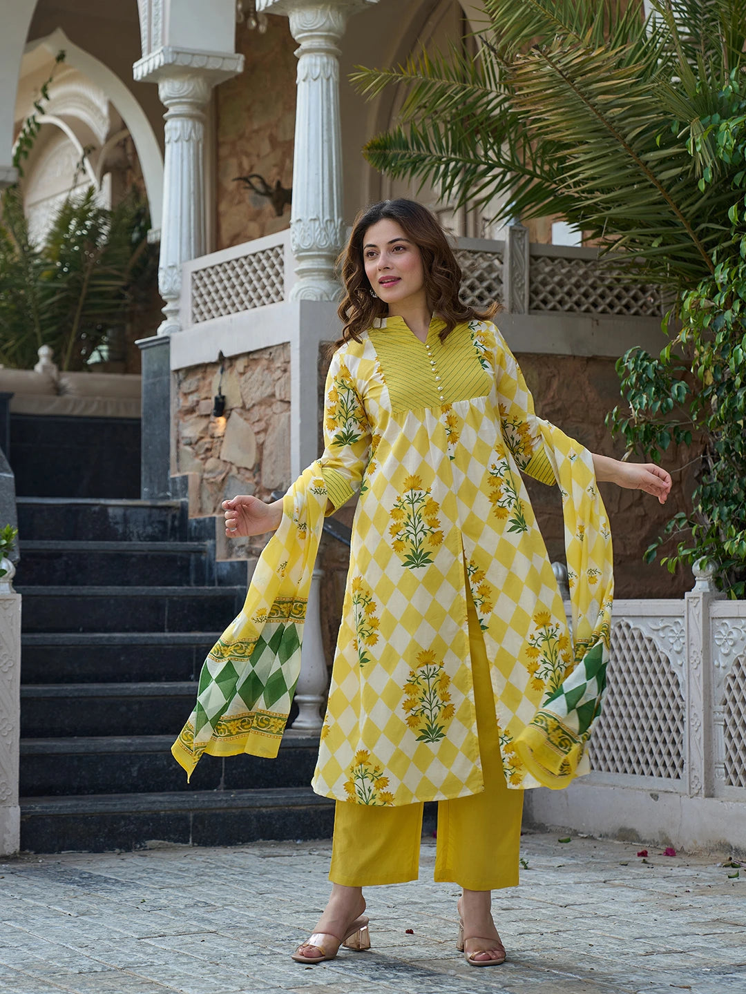 Yellow Floral And Geometric A-Line Button Yoke Kurta Trouser Dupatta Set